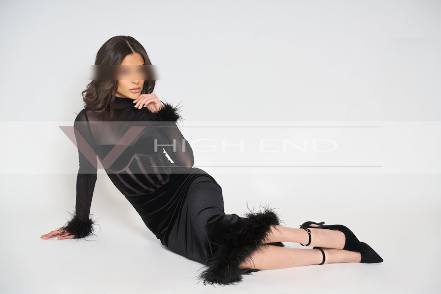 Luxury escort Ada on the light background
