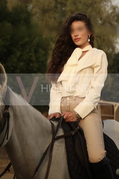 Very High End escort Florence in posing while horse ridding